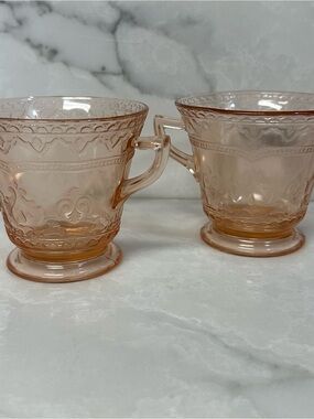 pink Depression glass creamer and sugar bowl set